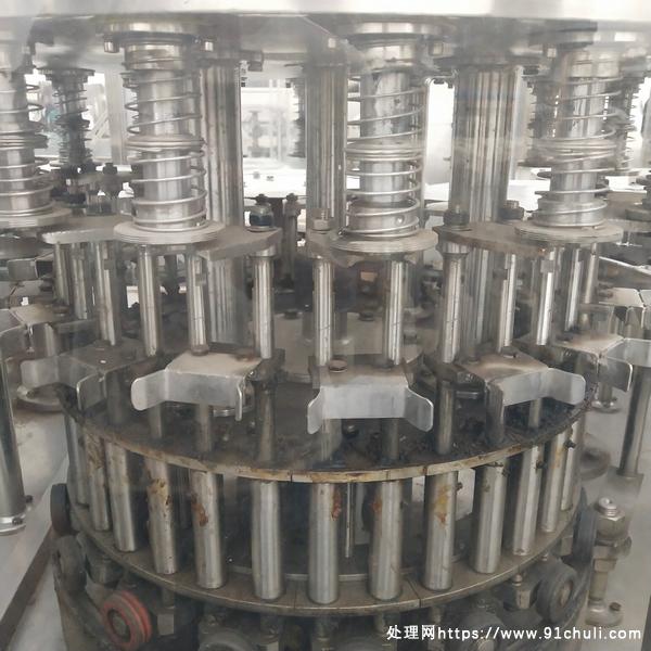 

出售果粒橙饮料罐装机四合一灌装机及配套设备联系我